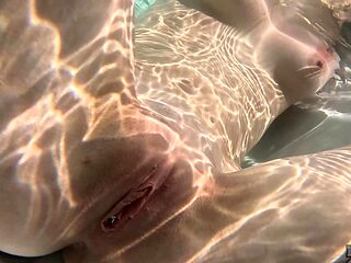 Skinny teen Mary Moon wanking her pussy by the pool in sensual solo action