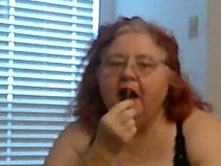 Mature BBW Redhead Nurse Vicki Talks to You as She Makes a Lipstick Applying Video for You!