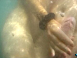 Young babe deepthroats and sucks his big dick on the beach