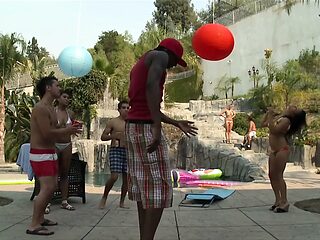 Busty Asian babe gets a hard black cock pounding by the pool