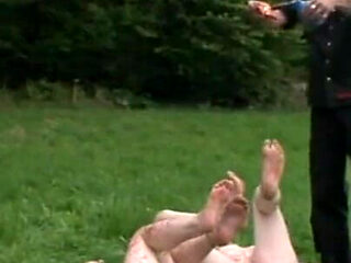 Dominating hanging pussy pinching in the park