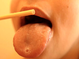 I’m Sucking and Licking a Popsicle, Playing with It Using My Lips and Mouth.