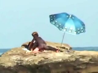 Beach Voyeur. Nude beach photo shoot ended with hardcore sex under the sun