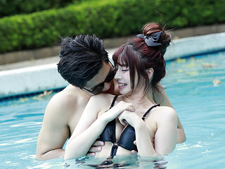 Chinese slut with natral boobs having sex in the pool