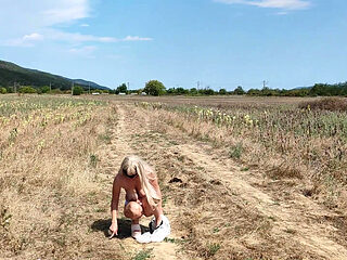 Slave tih undresses on the country road