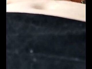 Beautiful busty Asian woman in a romantic sexual encounter gives a sensual