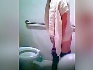Asian girls pissing in a school toilet filmed on camera