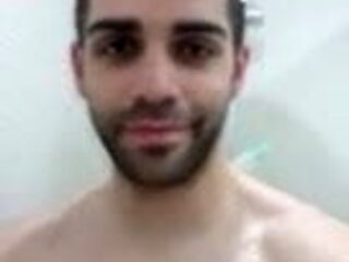 Spaniard man taking a shower 