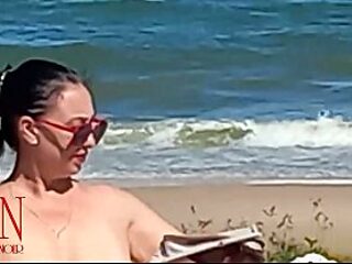 Nude beach. Peeping at a public beach 318