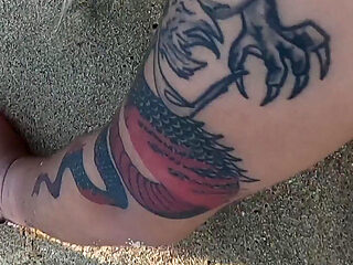 Tattooed MILF Nery Takes Hard Doggy Pounding on Beach