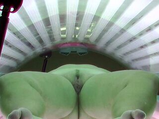 Busty and husky housewife in solarium