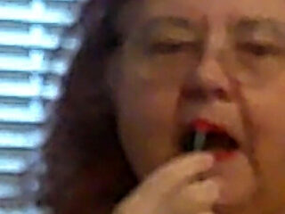 Mature BBW Redhead Nurse Vicki Talks to You as She Makes a Lipstick Applying Video for You!